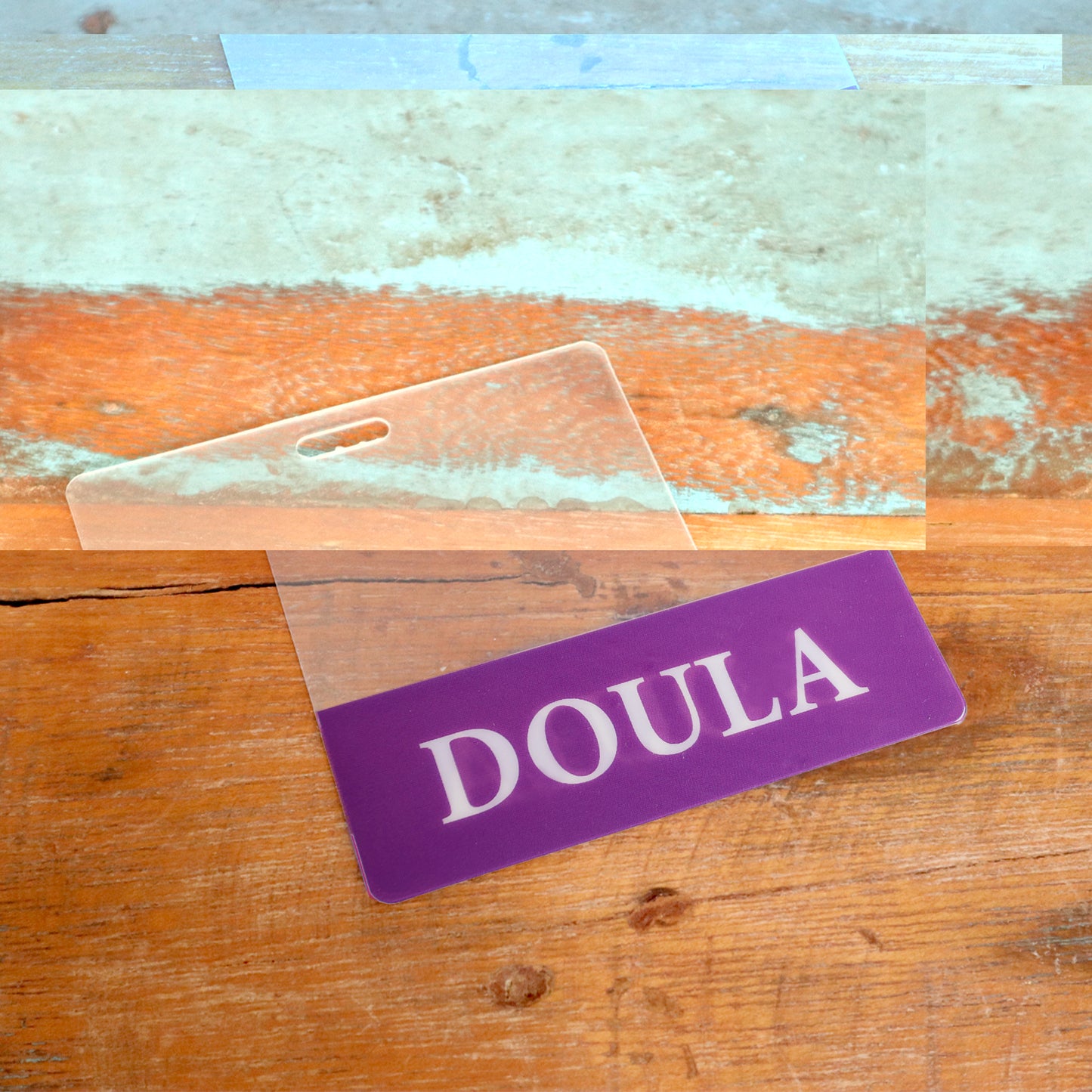 The Clear DOULA Badge Buddy - Horizontal Nurse ID Badge Backer features double-sided print and is ideal for birthing doulas or as a stylish addition to your badge holder. Sold by Specialist ID.
