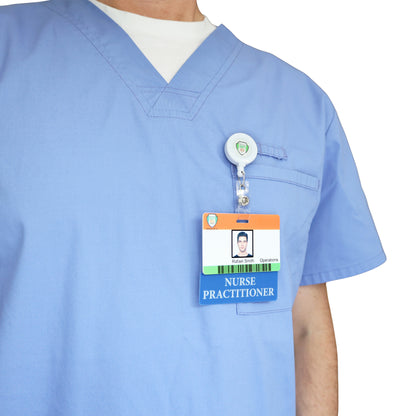 A person in light blue scrubs has a Clear NURSE PRACTITIONER Badge Buddy - Horizontal Nurse ID Badge Backer (double-sided print) clipped to their chest pocket, with the "Nurse Practitioner" text clearly visible; their face is partially out of frame.