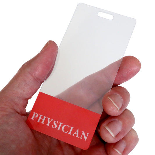 A hand holds a Clear PHYSICIAN Badge Buddy Vertical with Red Border for Physicians displaying an identification badge with a red "PHYSICIAN" section at the bottom, featuring a convenient vertical badge buddy design.
