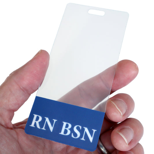 A hand is holding a Clear RN BSN Badge Buddy Vertical with Blue Border for Nurses, displaying the text "RN BSN." This registered nurse identification ensures clarity and professionalism.