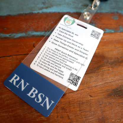 A close-up of a Clear RN BSN Badge Buddy Vertical with Blue Border for Nurses with a list of principles and QR codes. The text highlights key points for care, ownership, teamwork, and growth. The registered nurse's identification is set on a wooden surface.