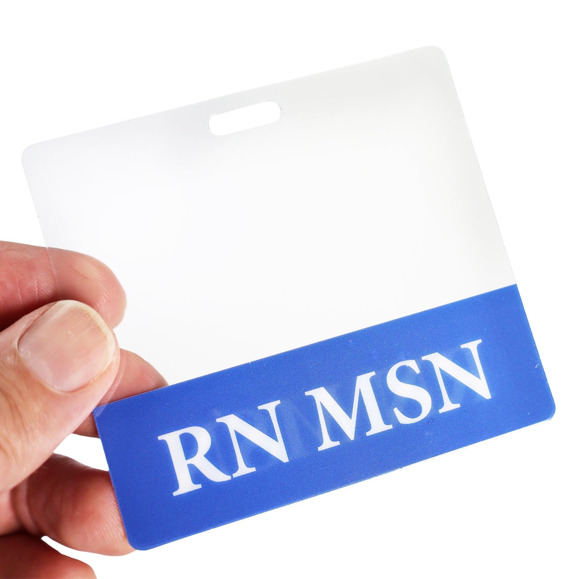 A hand holds the Clear RN MSN Badge Buddy, a horizontal nurse ID badge backer with double-sided print and a blue strip at the bottom displaying "RN MSN" in white letters. Sold by Specialist ID.