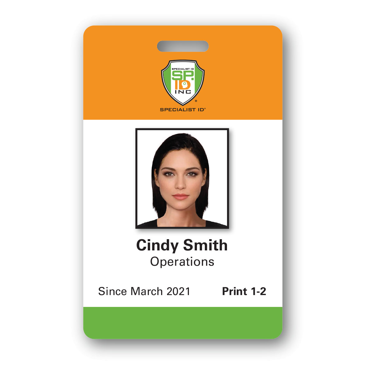 ID badge for Cindy Smith from the Operations department, employed since March 2021. Badge features a photo, Specialist ID Inc. logo, and "Print 1-2" at the bottom, produced through our Custom Printed Photo ID Badge service.