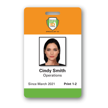 ID badge for Cindy Smith from the Operations department, employed since March 2021. Badge features a photo, Specialist ID Inc. logo, and "Print 1-2" at the bottom, produced through our Custom Printed Photo ID Badge service.