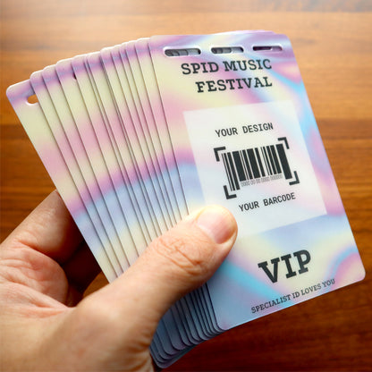 A hand displays pastel Custom Printed Event Badges with Three Slot Holes—design them your way for SPID Music Festival. Each badge features a barcode and placeholder text, perfect for personalized event access.