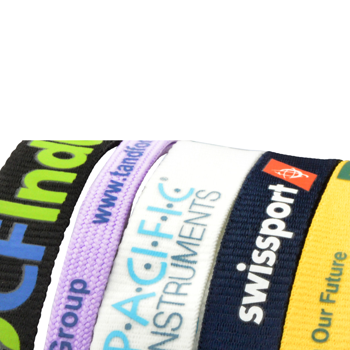 A close-up view of several colorful custom printed lanyards, each displaying different company logos and text in a variety of fonts and colors, showcasing the vibrant and personalized designs possible with Custom Printed Lanyards.