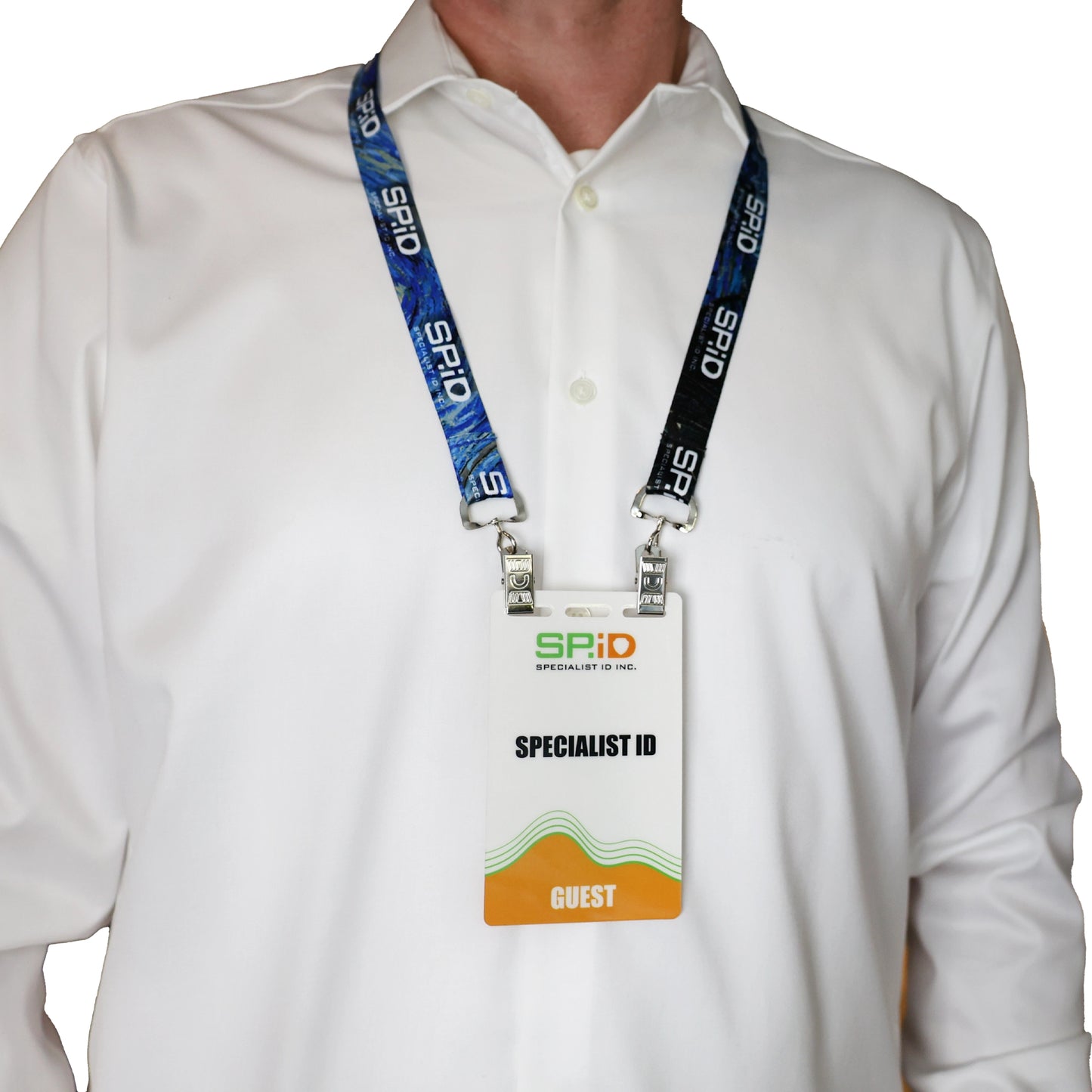 Person wearing a white dress shirt with a double-ended lanyard around a person's neck and 'SPID' design on the lanyard. Bulldog clips on each lanyard strap end holding the event badge through the slot holes provided on the badge.