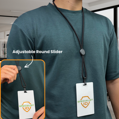 Person wearing a teal shirt and the Round Heavy Duty "No-Twist" Breakaway Black Lanyard w/ Slider (P/N FF-34H-BLK) with a white Specialist ID badge; inset highlights close-up of the adjustable round slider on the lanyard.