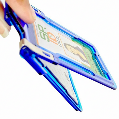 A hand holding a blue plastic Identity Stronghold RFID Blocking Secure Badgeholder Classic - Holds 1 Card - Shields 13.56MHz Signal (IDSH1004-001B-002) with a visible ID card inside, including a partially obscured photo and some text.