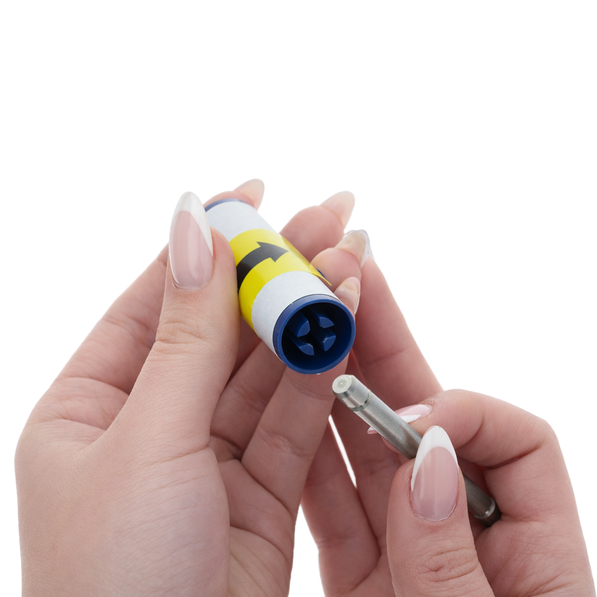 A person holds a Magicard 3633-0054 Cleaning Roller Kit tube, featuring yellow and blue colors and an arrow, and inserts a metal tool with a white tip into one end of the tube to prepare adhesive cleaning rollers for use with the Magicard 300 and 600 ID Card Printers (5 Pack).