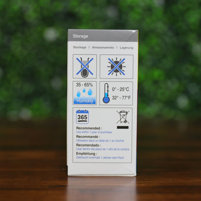 Storage instructions for the Magicard MB600KO Black Ribbon with Overlay (600 Prints for Magicard 600 Printer): keep dry, 35–65% humidity, 0–25°C, and use within one year of purchase. Multilingual guidance is included.