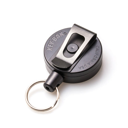 A black Key-Bak Mid Size Key Ring Badge Reel with Belt Clip (#6) with a metal belt clip and a circular key ring attachment.