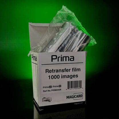 A box of Magicard PRIMA436 Retransfer Film for Prima 4 and Prima 8, 1,000 prints, is shown with film rolls partially wrapped in plastic against a green background.