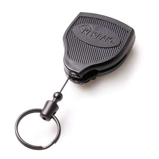 Key-Bak Super 48 Heavy Duty Key Reel with Belt Clip (S48K) with a black plastic casing and a metal key ring at the end. The casing, featuring the brand name "KEYBAK" imprinted on it, includes a sturdy belt clip and is equipped with a durable Kevlar cord.