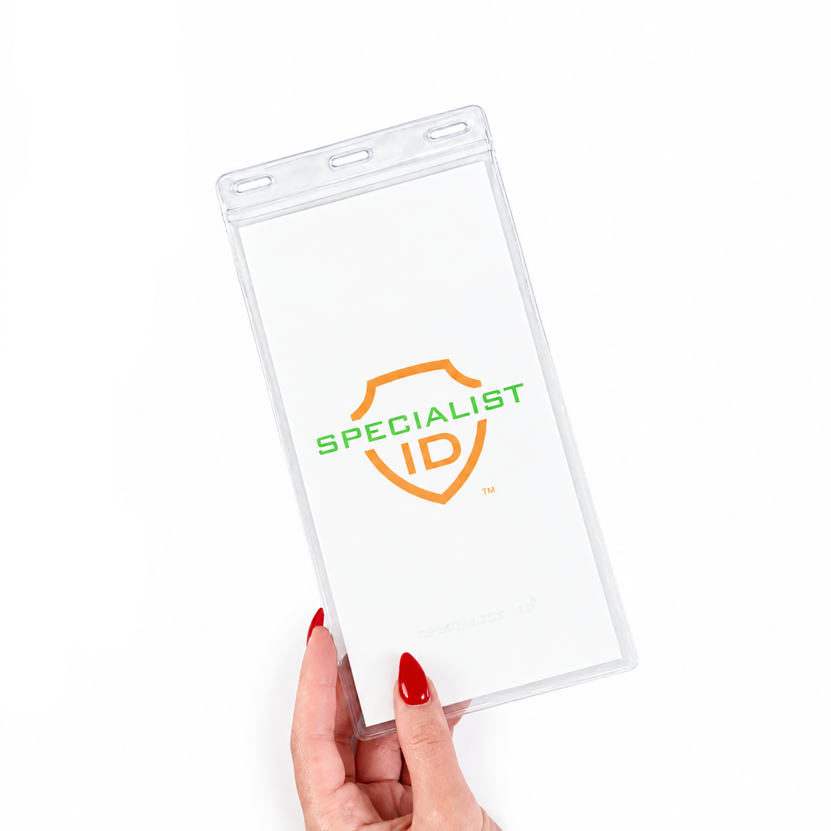 A hand with red nails holds a 4x8 Inch Clear Vinyl Ticket & Credential Holder with 3 Slots (SPID-1040), displaying a card with the Specialist ID logo on a white background.