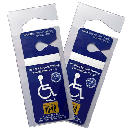 Two Florida disabled persons parking identification permits with blue backgrounds, white disability symbols, and expiration dates of 10-18. The text instructs to remove the Specialist ID Handicap Hang Tag Holder (SPID-1120) before driving.