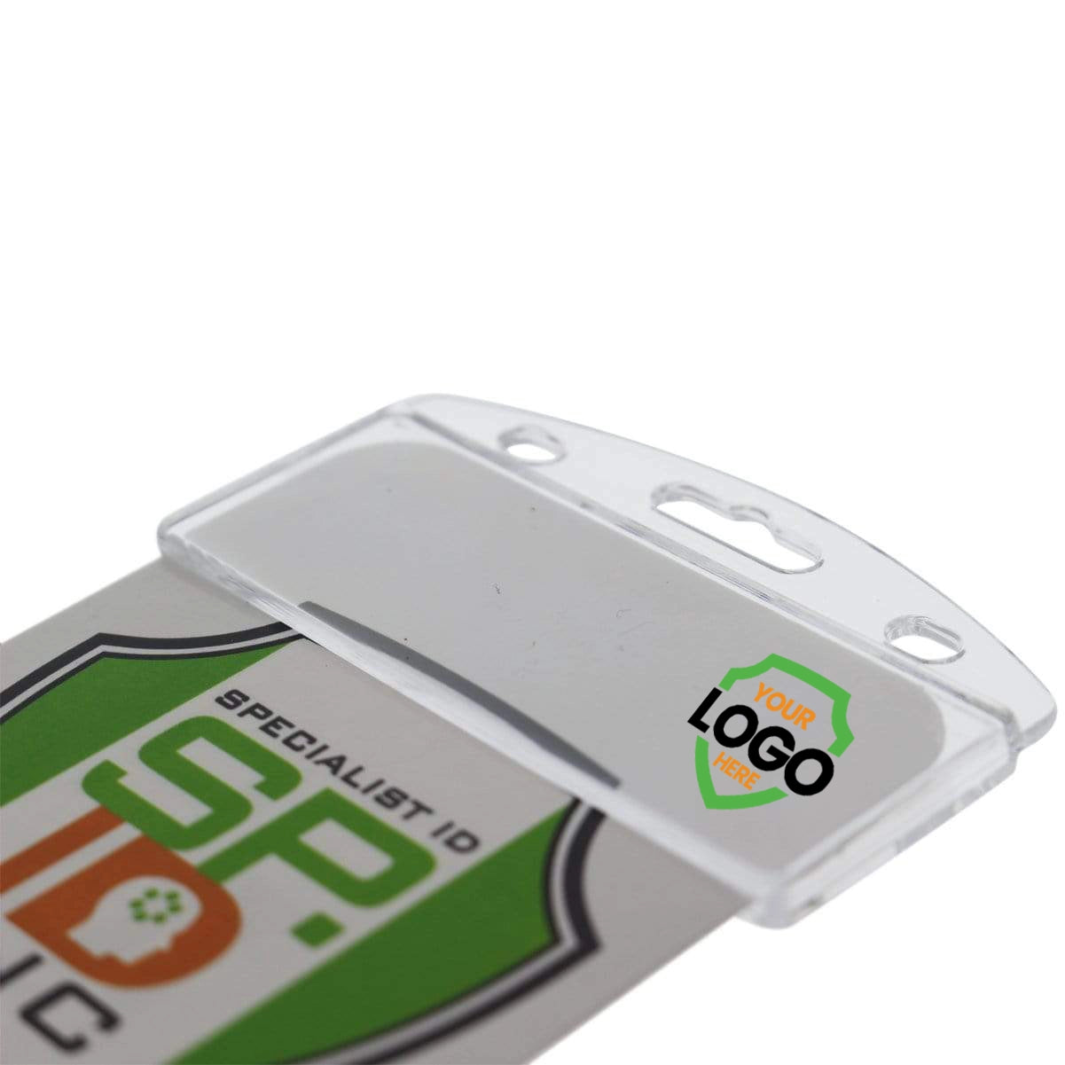 Clear plastic ID badge holder displaying a green and white card with "SP. ID" and a shield logo with "YOUR LOGO HERE." Ideal for corporate branding accessories, this Custom Vertical Half Card Badge Holder for Smart Chip (SPID-1200) - Add Your Logo ensures your brand stands out.