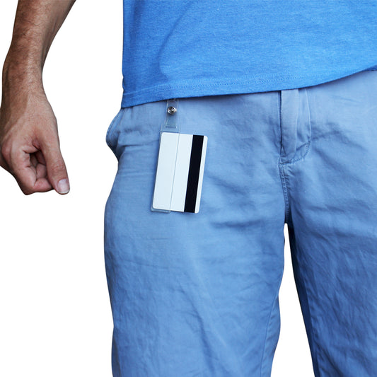 SPID-1380 half card holder worn from a belt loop with a sample mag-stripe card visible.