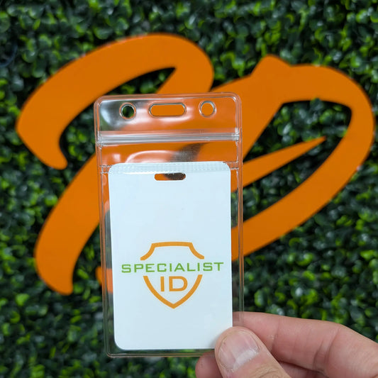 Hand holding SPID-1740 snug clear vinyl zipper badge holder with ID card