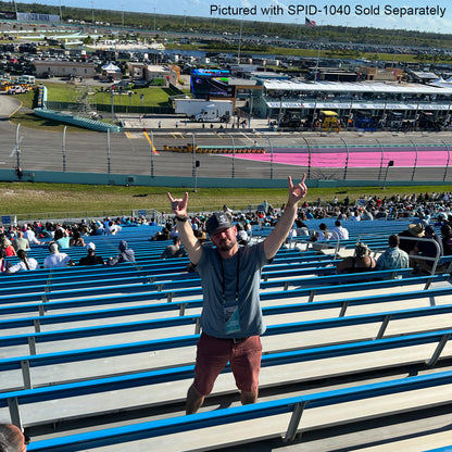 A person wearing a hat stands in a stadium with arms raised, showing a lively crowd and race track in the background. Annotations note "Double-Ended Lanyards with Bulldog Clips on Each Side - Comfort Neck Straps ID Holder for Special Event Badges Sold Separately", similar to how conference badges are often sold as additional items.