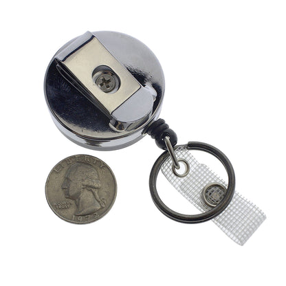 A Heavy Duty Badge Reel with Key Ring and Badge Strap - All Metal Retractor with Belt Clip - Black & Chrome (SPID-3180) with all-metal construction, complete with a key ring and a quarter coin placed beside it for scale.