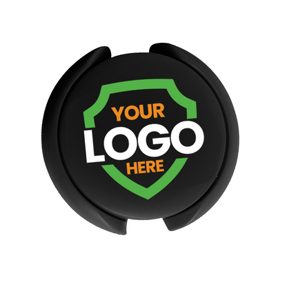 A black circular object with a green and orange shield logo in the center, displaying the text "YOUR LOGO HERE," ideal for Custom Stethoscope ID Tags - Upload Your Logo to Customize to aid in medical staff identification.