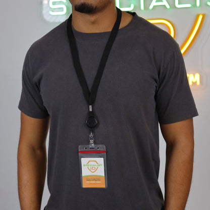 A person wears a black Cruisin Through Life™ Retractable Badge Reel Lanyard with Resealable Zip Holder (SPID-9101), featuring a retractable badge reel attached to a clear, resealable zip ID holder.