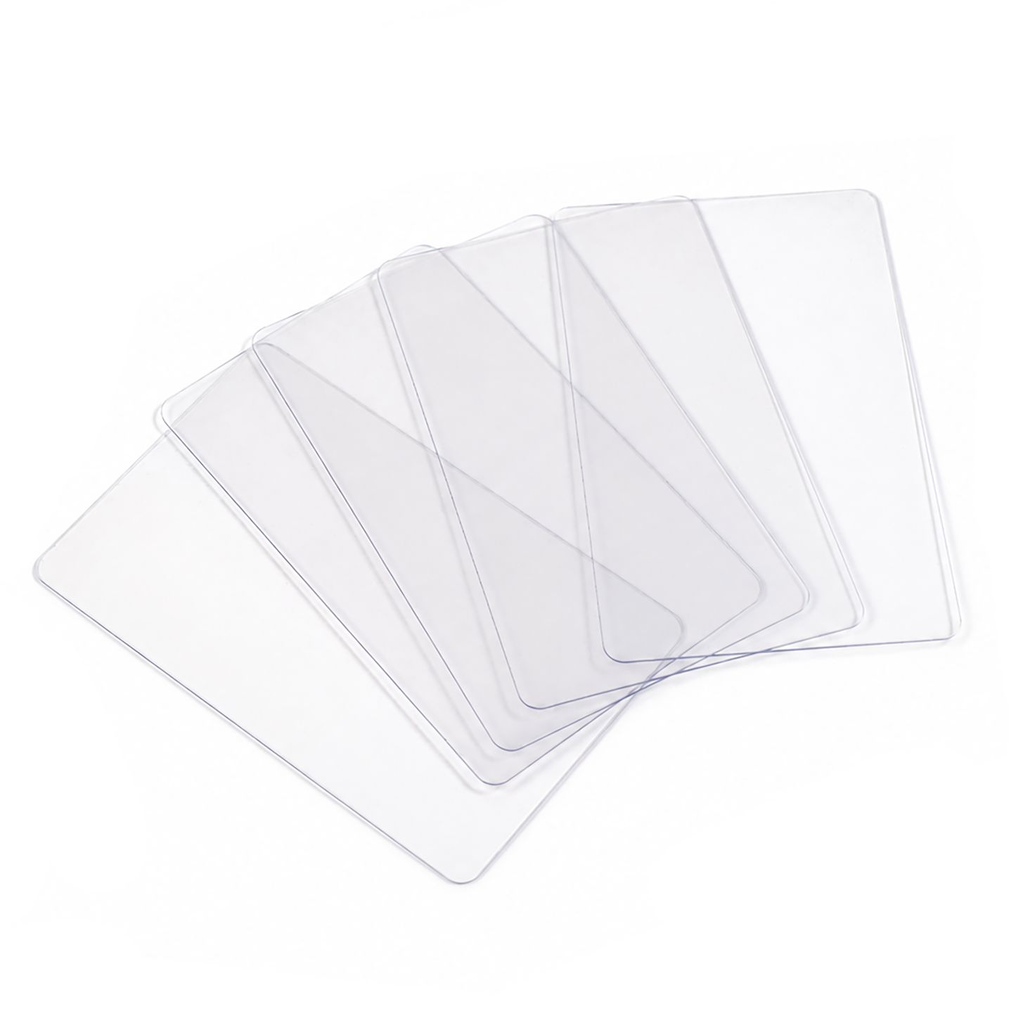 Six Blank White PVC Cards for ID Badge Printers (CR80 30 Mil, SPID-9630) are fanned out on a white background.