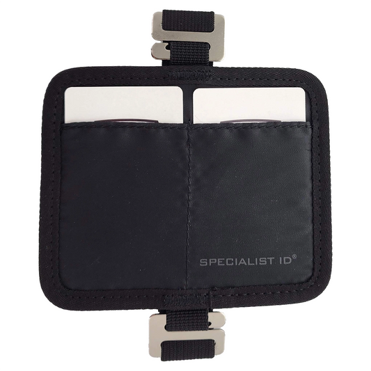 A black fabric Fleet Vehicle Visor 2 Card Holder & Document Organizer for Fuel Cards and Fleet Documents with two clear pockets and metal clips on the top and bottom, perfect for use as a document organizer. It has the text "SPECIALIST ID" printed on the bottom right.