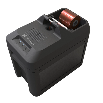 A compact, black electronic device with a roll of red tape loaded inside. The device, known as the Smart-Bit 651577 Ribbon Shredder by IDP, features three buttons on its front side and branding that reads "SmartCAT." It offers secure disposal for optimal data protection.