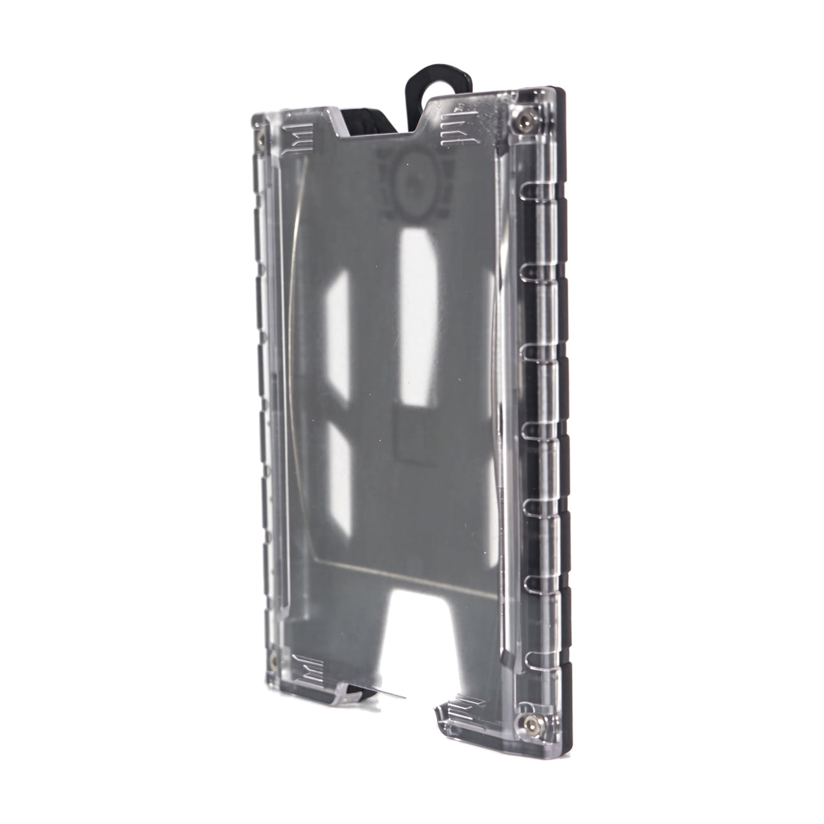 Black TEST-123 rigid vertical ID badge holder turned 45 degrees to the front, showing the depth of the hard shell, the ribbed side rail and the clear front panel.