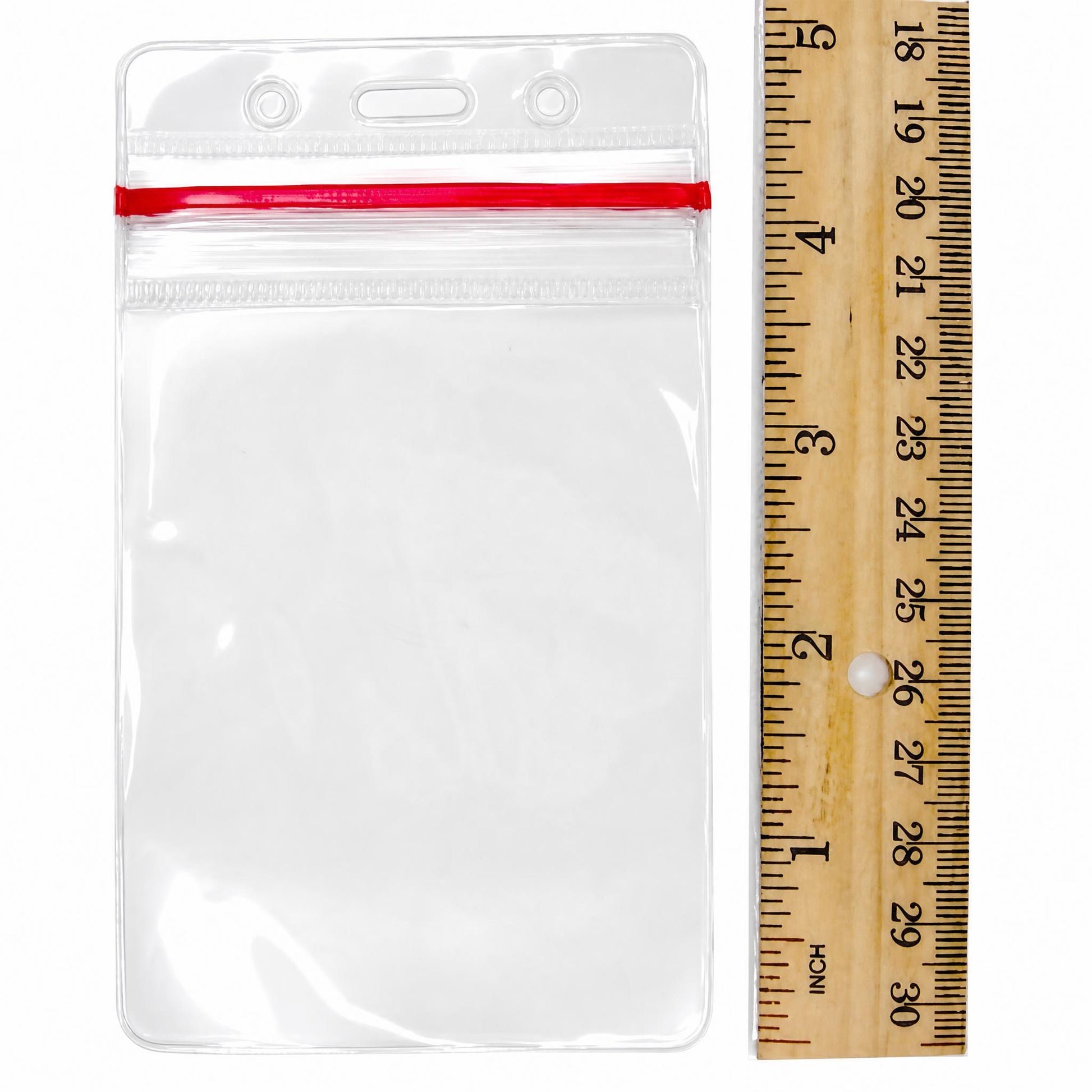 VBH-V-ZIP clear vertical vinyl badge holder with zipper top shown with ruler for size reference