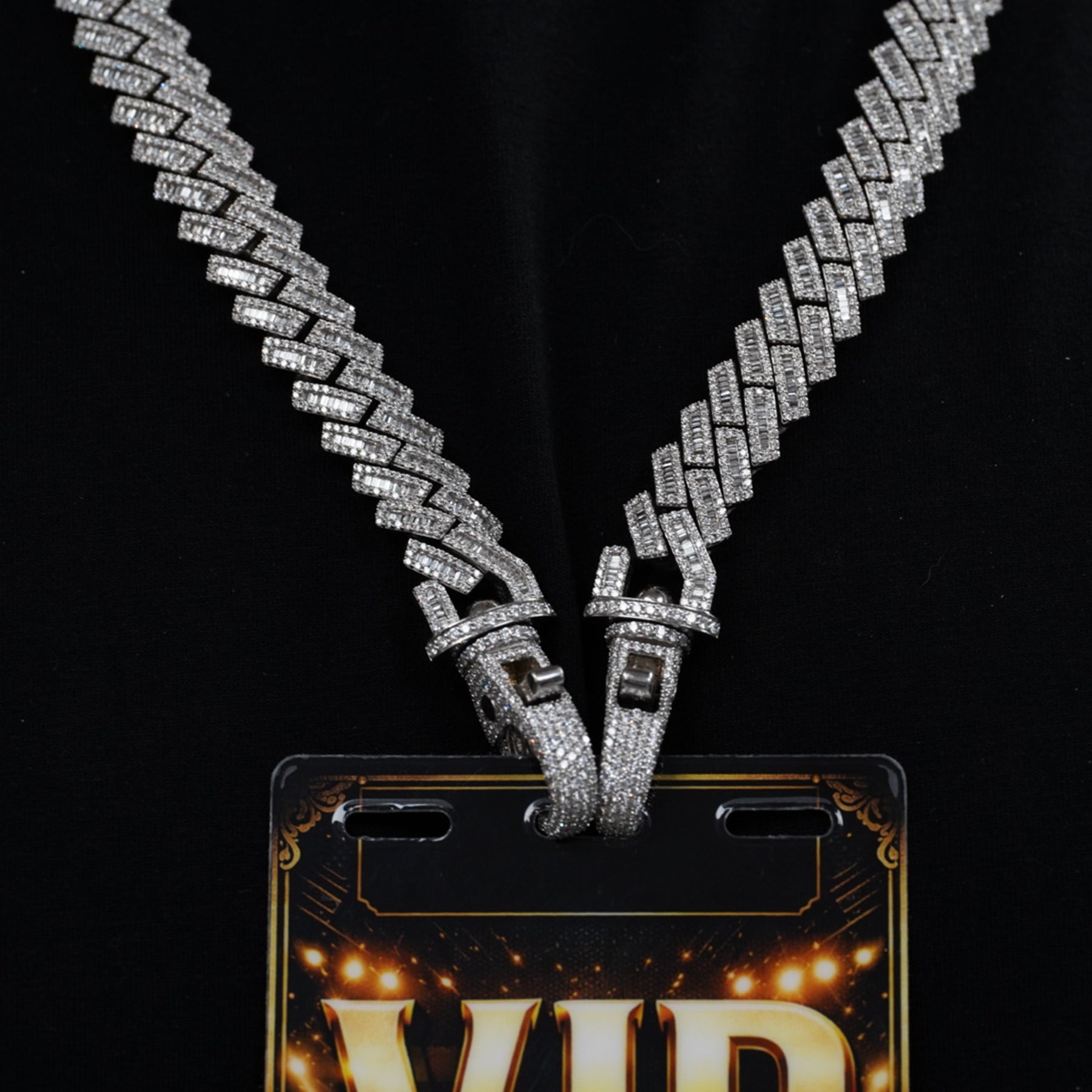 VIP credential chain connected to event badge against dark background