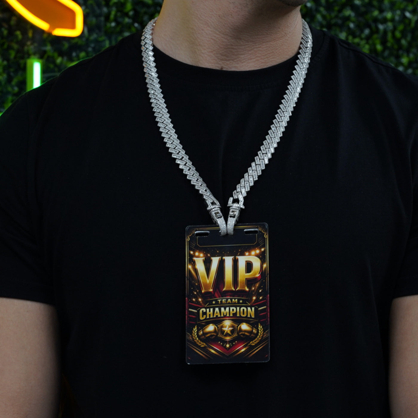 Model wearing full diamond studded VIP credential chain with badge visible from front