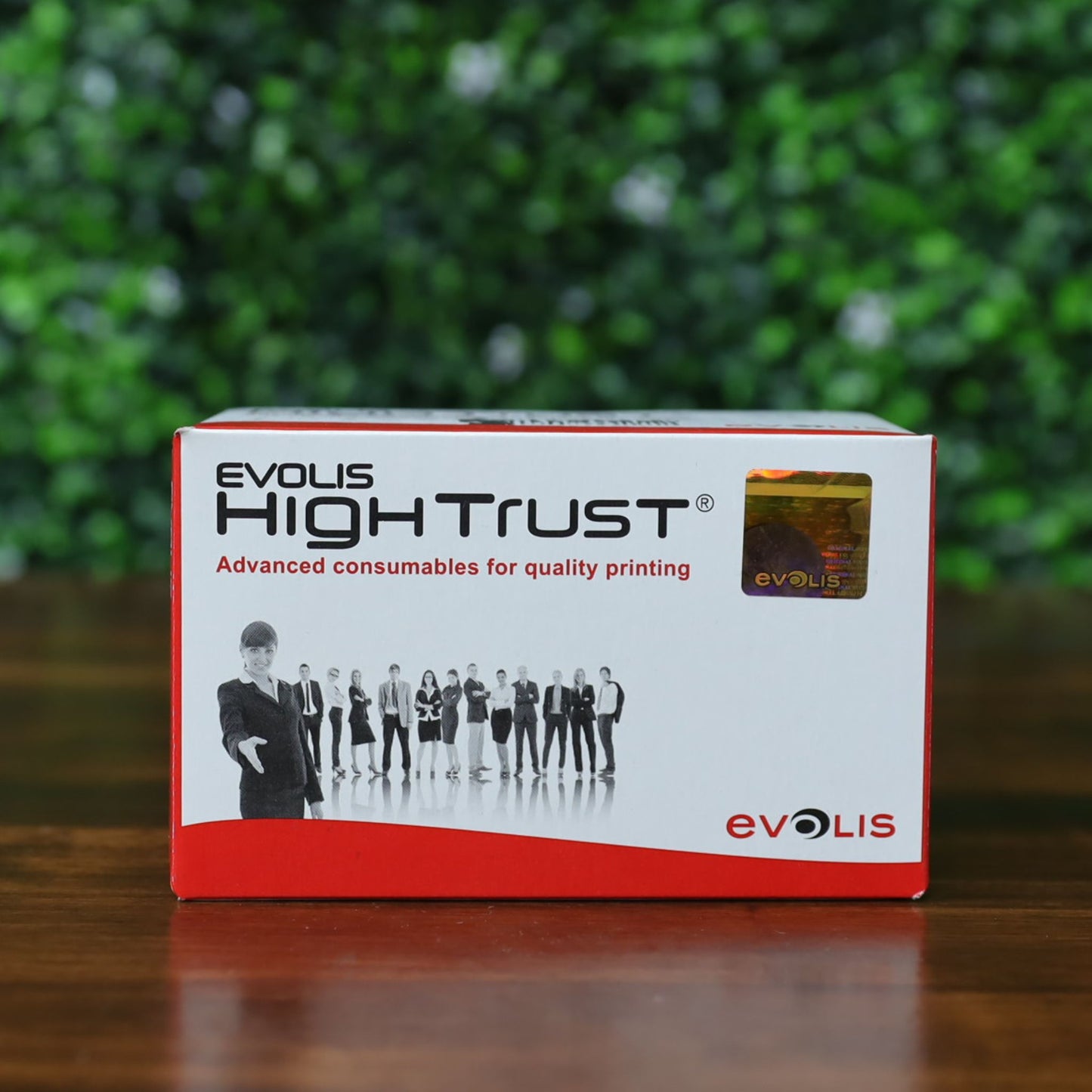 Front of Evolis R3314 YMCKOK Ribbon box displaying High Trust branding, Evolis security hologram, and group image of professionals. Photographed and sold by Specialist ID, an authorized Evolis dealer.