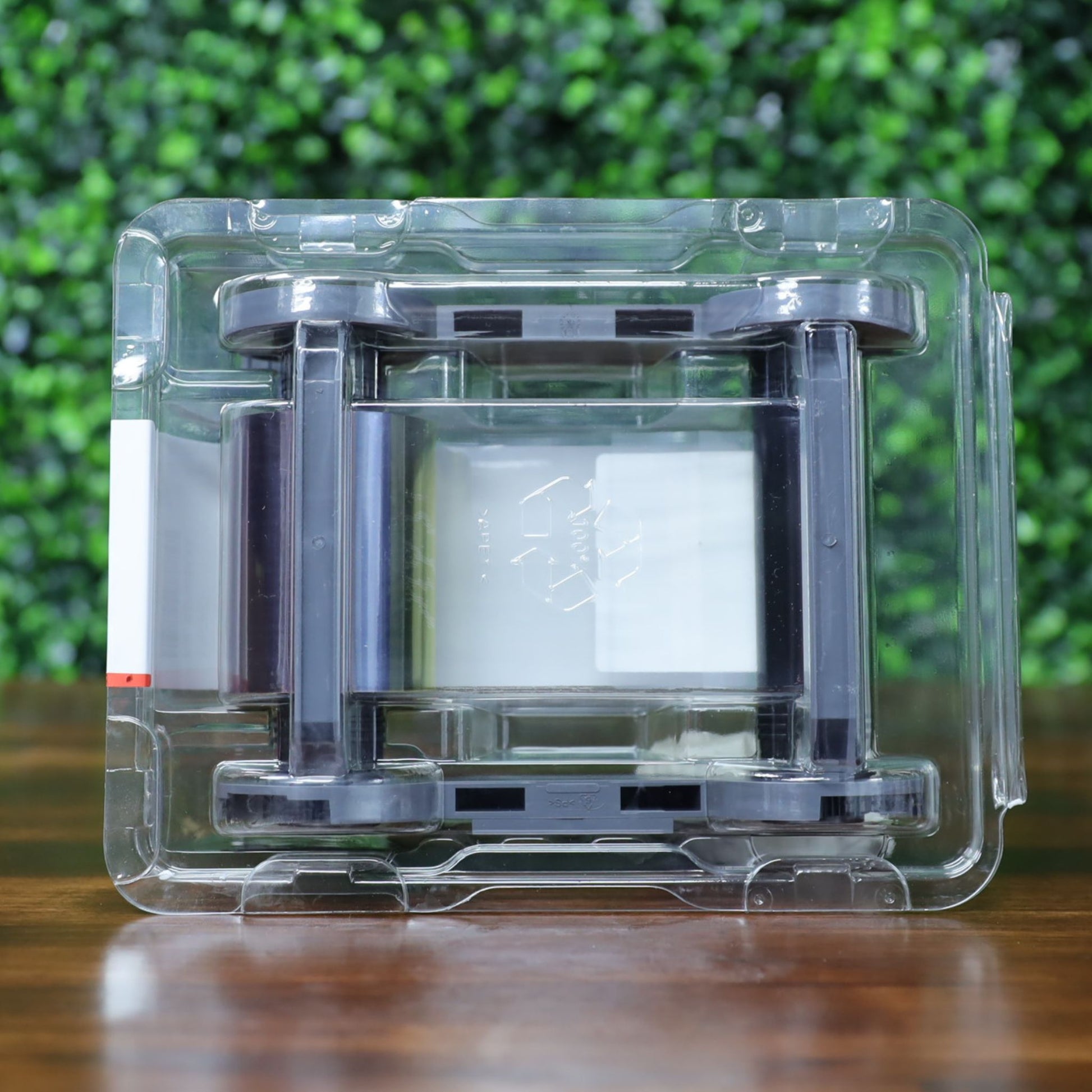 Evolis R5F008AAA YMCKO ribbon lying flat with the bottom label facing up, showing 300 prints per roll and model number clearly. Photographed and sold by Specialist ID, an authorized Evolis dealer.