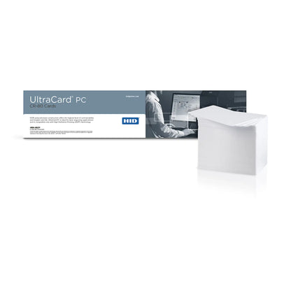 Displayed is a box of HID FARGO 082289 UltraCard PC cards, which are compatible exclusively with HDP printers. The open box displays a stack of durable white polycarbonate cards, each measuring 30 mil in thickness and in the CR-80 format. The packaging features a sleek professional design and prominently displays the product logo.