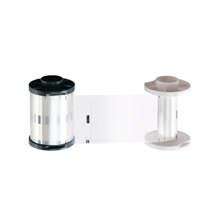 A HID Fargo 82601 PolyGuard - 250 Prints, 1.0 mil Clear Patch Laminate ID card ribbon cartridge featuring two reels, one black and one white, connected by a clear, flexible tape meant for insertion into an ID card printer. Compatible with Fargo PolyGuard Laminate systems or other Fargo printer ribbons for enhanced durability and quality. Sold by Specialist ID, an authorized Fargo dealer.