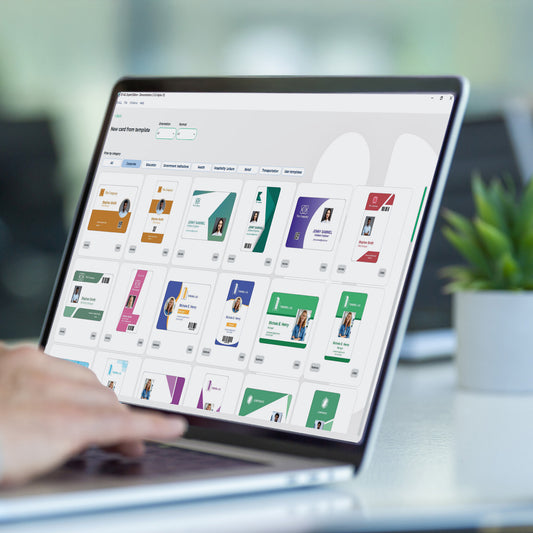 ID-ALL card software on a laptop showing the card template gallery