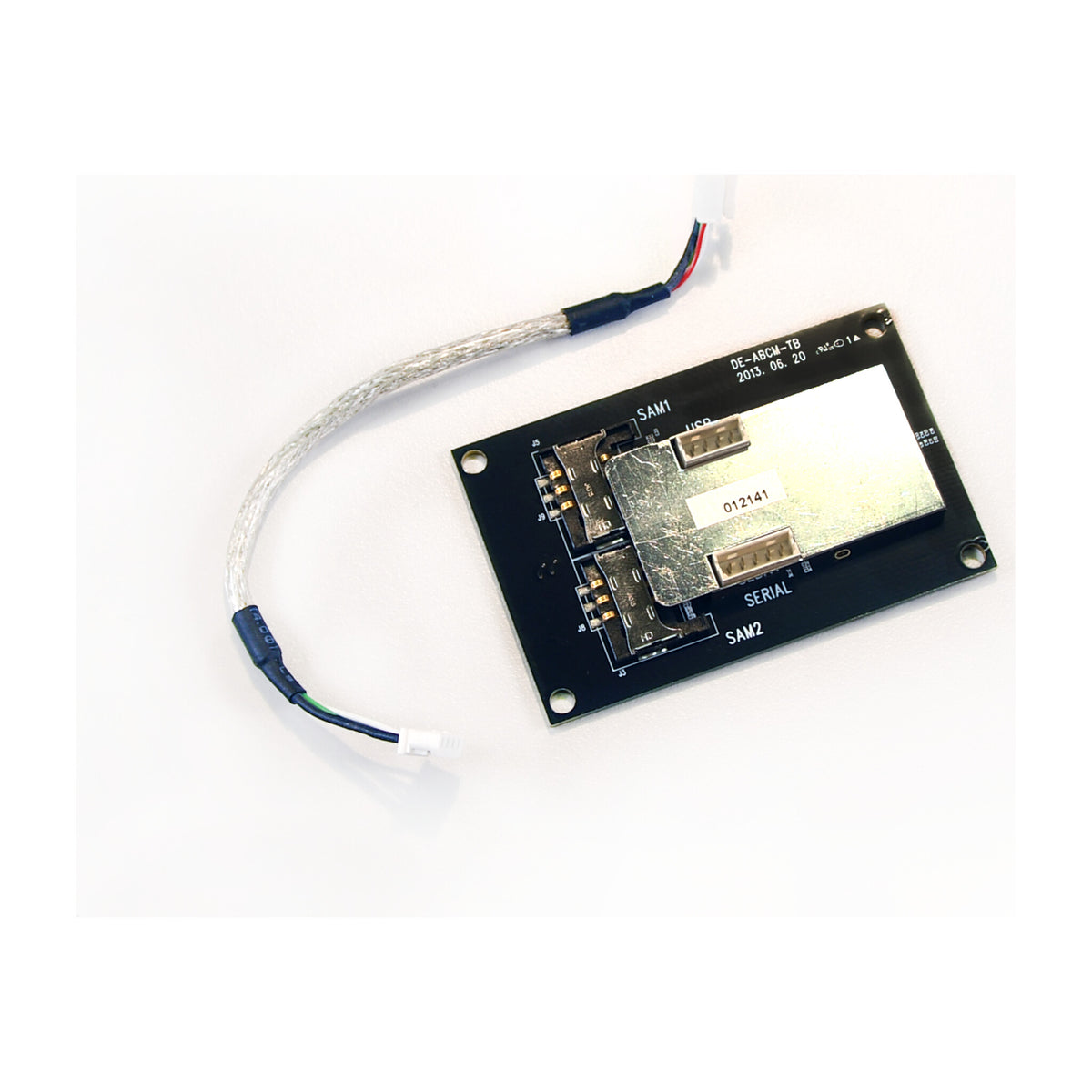 IDP contactless encoder module: reader board on a black antenna plate with its connection cable