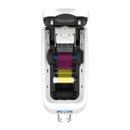 Top view of an open Magicard 600 Single-Sided ID Card Printer displaying its internal components, including color-coded cartridges in cyan, magenta, yellow, and black. The device boasts a resolution of 300 x 600 dpi for high-quality ID card printing. Sold by Specialist ID. 
