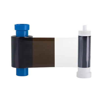 Magicard MB600KO Monochrome Ribbon for the Magicard 600 ID card printer shown on a white background. Black and clear overlay panels visible on the ribbon cartridge with blue supply spool. Sold by Specialist ID, an authorized Magicard dealer.