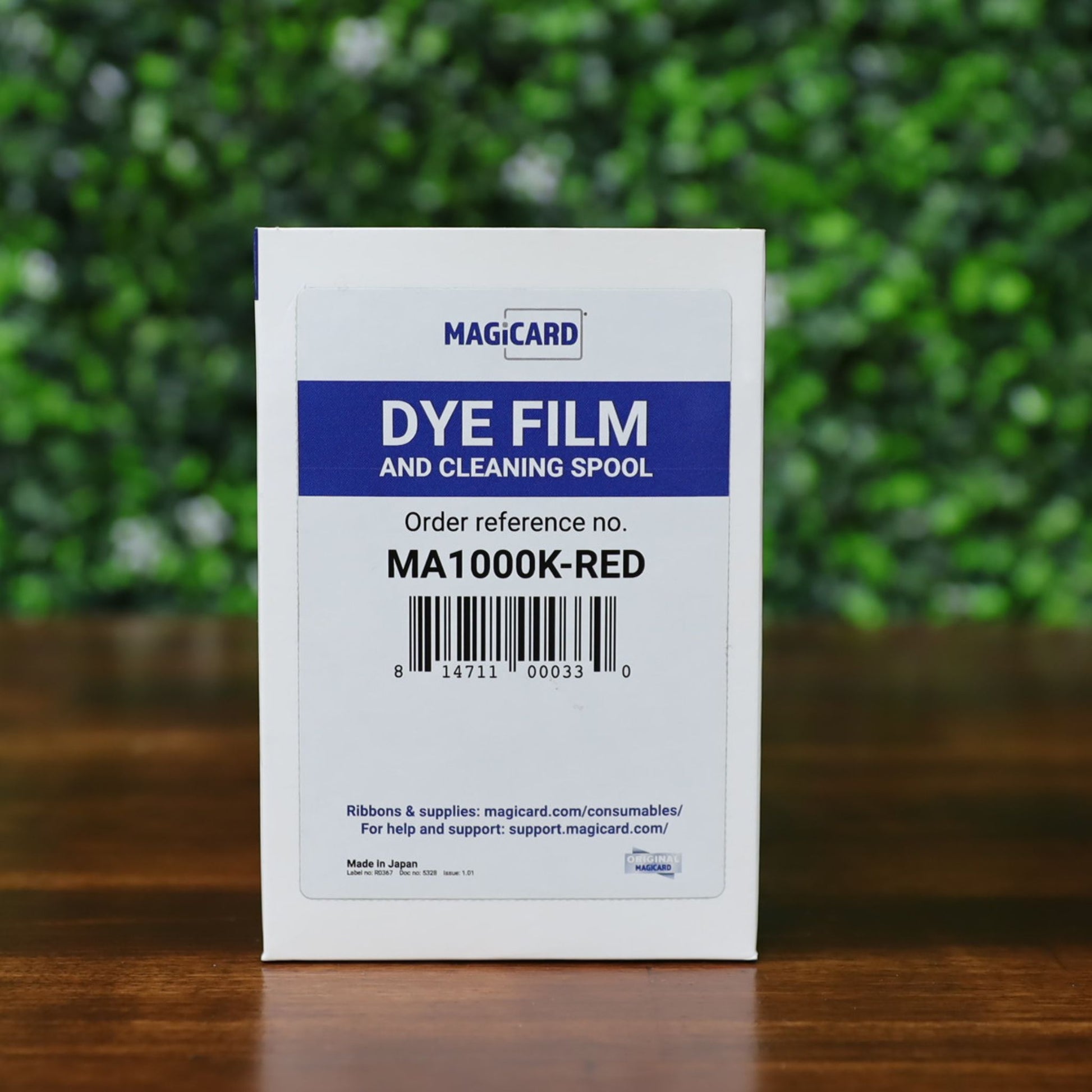 Front of Magicard MA1000K-RED ribbon box showing product label, barcode, and official Magicard branding. Photographed and sold by Specialist ID, an authorized Magicard dealer.