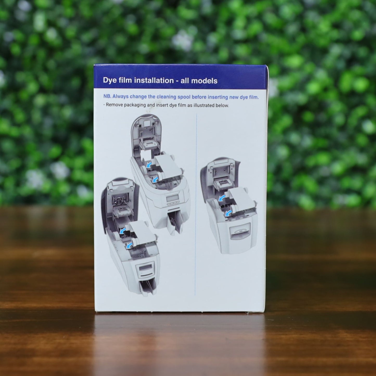 Back of Magicard MA1000K-RED ribbon box showing step-by-step dye film installation instructions for all compatible Magicard printer models. Photographed and sold by Specialist ID, an authorized Magicard dealer.