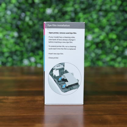 Side panel of Magicard MB200YMCKO/2 YMCKO ribbon box showing dye film installation steps with visual diagram for printer loading. Includes cleaning guidance and directional illustration. Photographed and sold by Specialist ID, an authorized Magicard dealer.