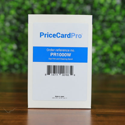 Front label of the Magicard PR1000W dye film and cleaning spool box, displaying the order reference number, barcode, and manufacturer details. Photographed and sold by Specialist ID, an authorized Magicard dealer.