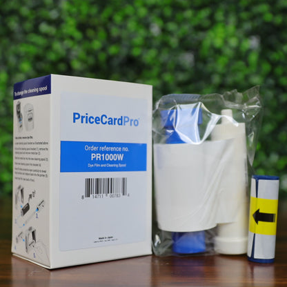 Magicard PR1000W white monochrome ribbon with cleaning spool and packaging box. Includes barcode, cleaning instructions on the side, and sealed ribbon in clear plastic. Designed for PriceCardPro printers. Photographed and sold by Specialist ID, an authorized Magicard dealer.