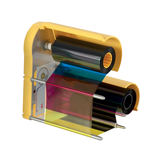 Close-up of a yellow Magicard Prima833 YMCKK ribbon cartridge removed from its housing, showing the five exposed dye panels—yellow, magenta, cyan, and two black—wound between the supply and take-up spools, ready for dual-sided retransfer ID card printing.
