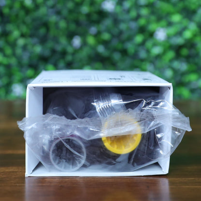 Magicard Prima834 YMCK-UV ribbon shown partially inside original box, top facing up. Sealed in anti-static bag with color-coded spools visible. Photographed and sold by Specialist ID, an authorized Magicard Dealer.