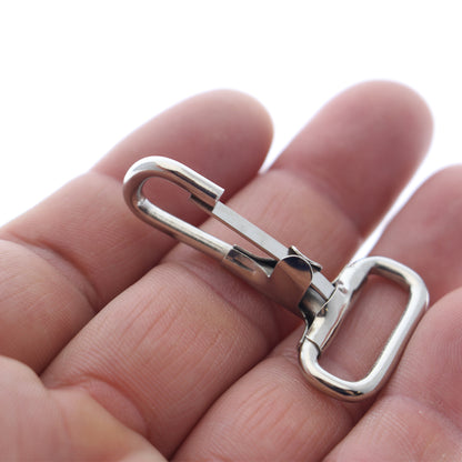 A hand holding a small, 1 3/4" Non Swivel J Hook with Rectangular End - DIY Lanyard and Craft Accessories (6920-2400).